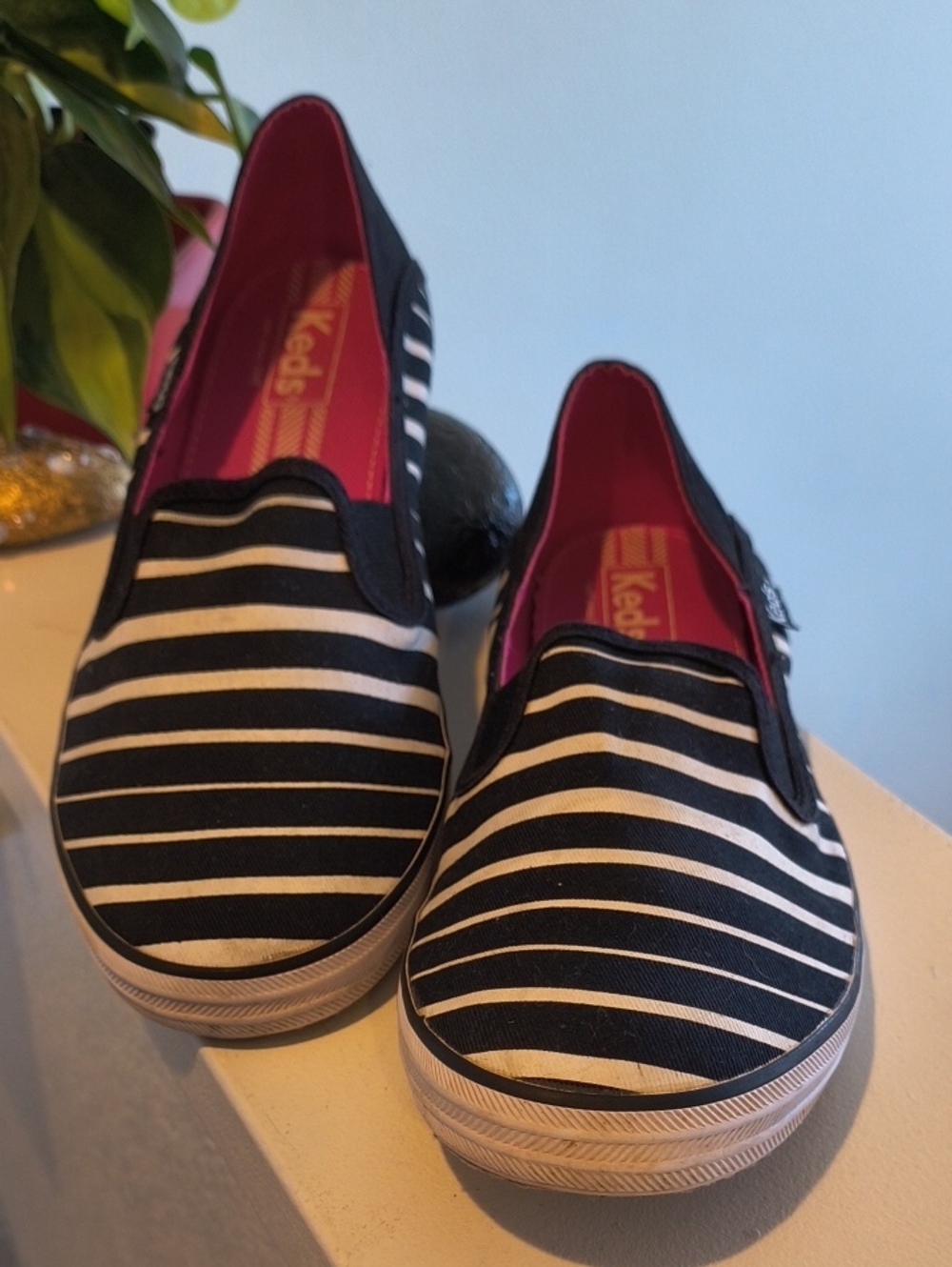 Keds Black & White Striped Slip-On Sneakers with Pink Lining